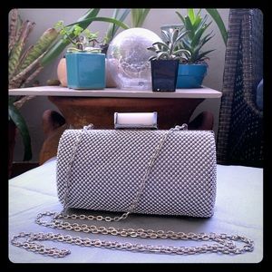 Small, textured silver clutch w shoulder strap